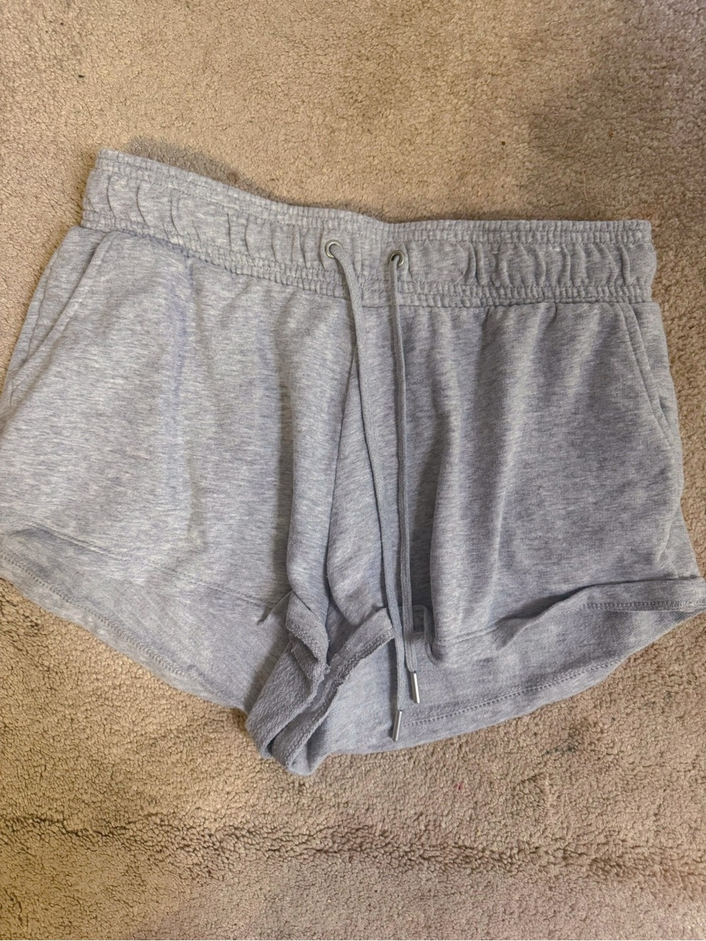 Grey sweat shorts with drawstring